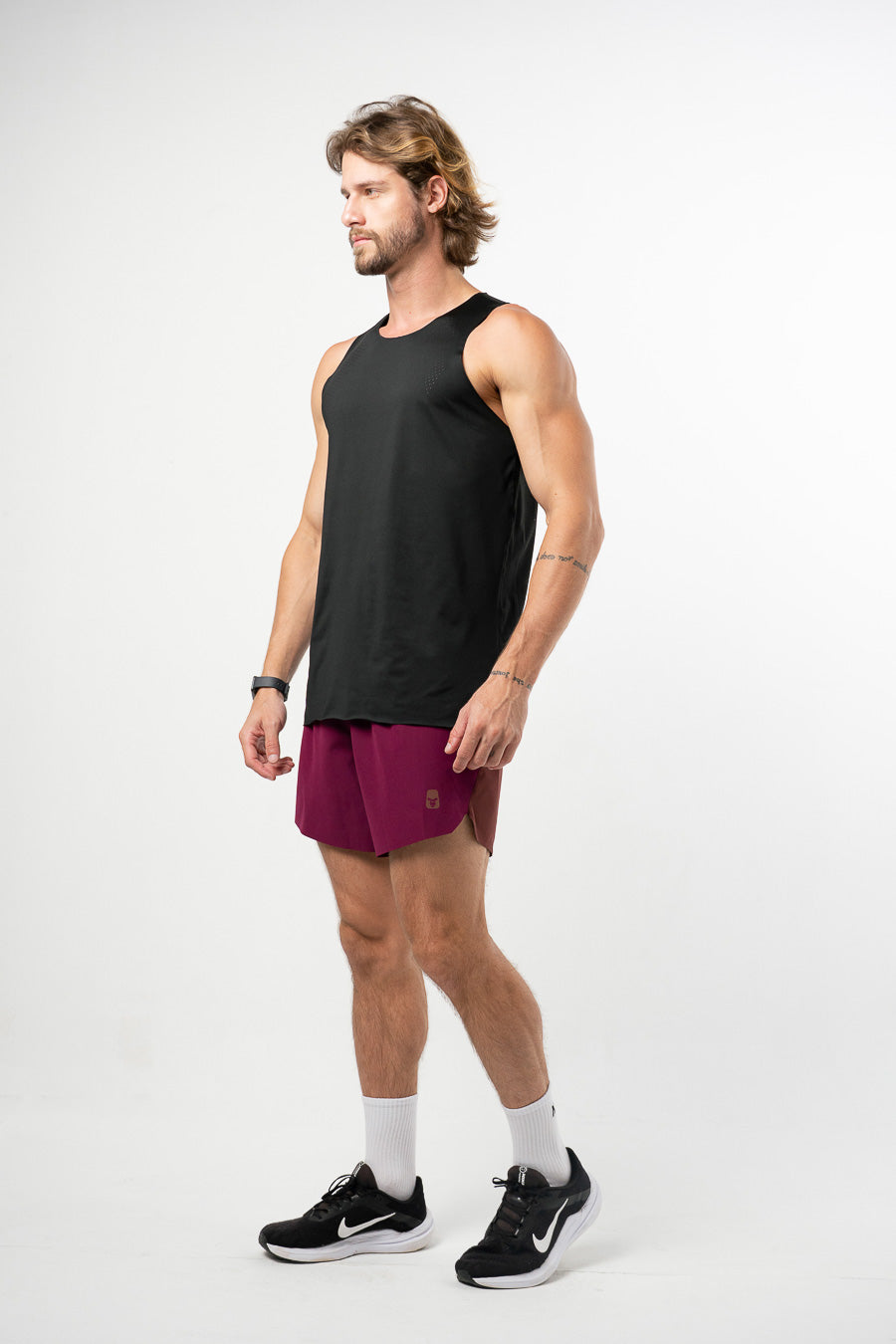 Pantaloneta Running Pro Retro Berenjena
